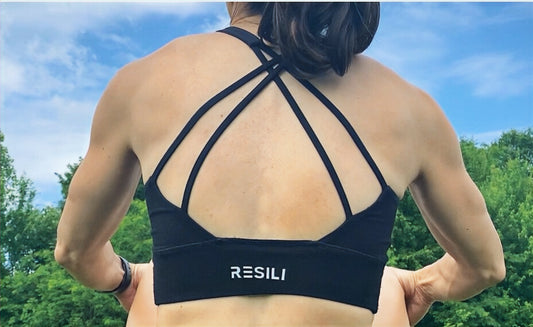 Resili Sports Bra is made from bamboo and spandex with nonremovable pads. . It is soft, comfortable, and has criss cross straps across the back. 